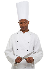 Image showing Black man, chef and sharpen knife in studio isolated on a white background. Cooking, professional and honing steel tool, metal and utensil for restaurant preparation, working and culinary service