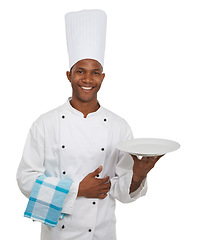 Image showing Portrait, chef and plate in studio in hospitality career, happy server, waiter and professional in food industry. African man, catering job and smile on face and serving with hat by white background