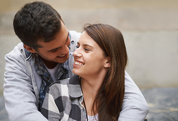 Image showing Eye contact, happiness and face of couple hug together, relax and enjoy outdoor date for Valentines Day anniversary. Trust, connection and people smile for relationship security, soulmate or devotion