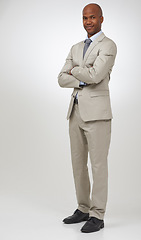 Image showing Portrait, business and black man with arms crossed, employee and worker isolated on white studio background. African person, model and consultant with a suit, startup and entrepreneur with confidence