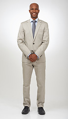 Image showing Studio portrait, business fashion and black man confident in professional suit, stylish outfit or fashionable apparel. Corporate style, company dress code and African sales agent on white background