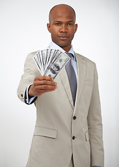 Image showing Black man, portrait and money fan for finance, wealth or savings on a gray studio background. Businessman or employee in business fashion with cash, dollar bills or paper for financial investment