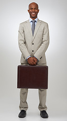 Image showing Black businessman, portrait and happy by briefcase in studio, confident and finance career in pride. African man, smile face and positive as accountant and corporate professional by white background