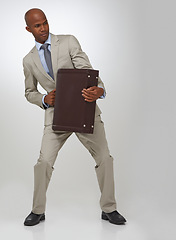 Image showing Businessman, briefcase and studio as professional lawyer or prepared for opportunity, corporate or growth. Black person, suit and white background or employee ready for employment, career or mockup