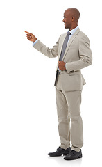 Image showing Businessman, presentation and pointing for advertising or marketing on a white studio background. Black man or young employee showing choice, deal or information in business clothing on mockup space