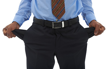 Image showing Person, hands and empty pocket as business professional for no money or unemployed, debt or financial crisis. Fingers, pants and stock market crash or problem in studio, white background or mockup