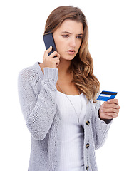 Image showing Woman, credit card and phone call for ecommerce, stress and online payment for purchase in studio. Female person, confusion and transaction on technology, customer experience and white background