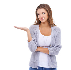 Image showing Smile, woman and hand with palm space in studio for announcement, news or offer on white background. Information, gesture and female model show promotion, feedback or review, deal or platform mockup
