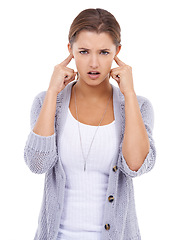Image showing Noise, portrait or woman with fingers in ears in studio for volume control, sensitive or block on white background. Annoyed, stop or model with not listening gesture, sound or frustrated by tinnitus