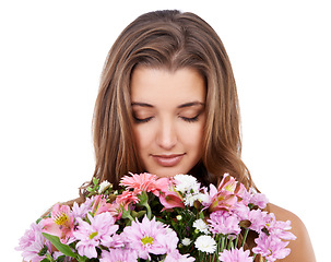 Image showing Spring flowers, woman and smell for bouquet in studio, romantic and floral gift of valentines day. Young model, relax or eyes closed of scent on natural plants or birthday present by white background
