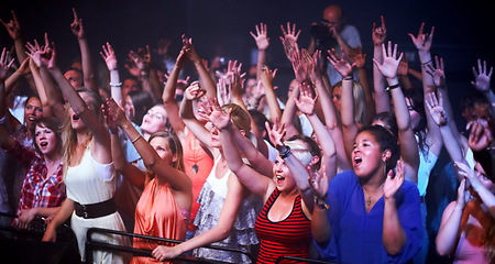 Image showing Music, fans and people dance at concert, event and lights from stage for performance at festival. Nightclub, party and audience celebration or excited crowd listening to dj and techno with freedom