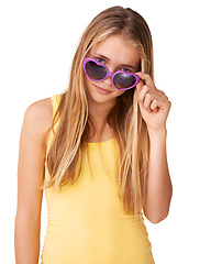 Image showing Sunglasses, fashion or portrait of girl teenager in studio isolated on white background with blonde hair. Pride, casual child or confident model with swag, cool style or trendy heart shaped eyewear