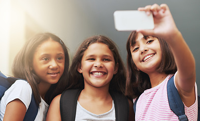 Image showing Friends, children and smile for selfie in elementary school, educational memory and learning together. Diversity, young students and group of girls taking picture for social media, photography or fun