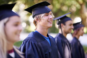 Image showing Man, graduate and university achievement for education with ceremony outdoor. Students, smile and graduation event for academic success, higher learning and certification with pride and profile