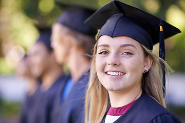 Image showing Happy woman, portrait and student in outdoor graduation for education, learning or qualification. Female person or graduate smile in group for higher certificate, diploma or degree at campus ceremony