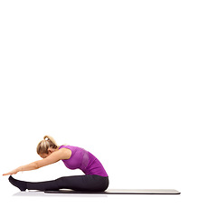 Image showing Woman, stretching or fitness on mat in studio for exercise, workout or healthy body with mock up space. Person, training or wellness for abdomen muscle or core strength and yoga with white background