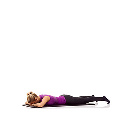Image showing Yoga mat, health and relax with woman in studio for stretching, exercise and wellness. Workout, fitness and self care with female person on floor of white background for pilates, body or mockup space