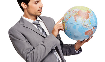 Image showing Business man, globe and destination choice isolated on a white studio background. Agent, professional suit and planet map for geography, international travel or pointing at worldwide earth on journey