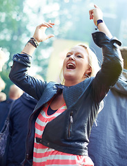 Image showing Woman, dance and cheering outdoor at music festival for freedom, performance and entertainment with crowd. Person, happy or shouting at event, concert or show with audience in nature for summer party