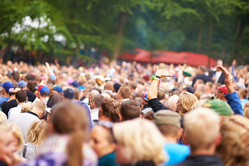 Image showing Music festival, crowd and outdoor dancing for celebration event party, listening disco in nature forest. People, concert and social experience for audio carnival performance, audience in summer rave