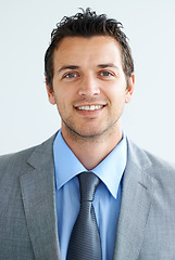 Image showing Portrait, corporate and happy business man isolated on a white studio background. Face smile, professional employee and confident lawyer, attorney or consultant working in suit for career in Spain