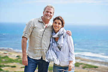 Image showing Mature, couple and happy portrait together at sea, ocean or hug on the beach outdoor. Summer, vacation or holiday with old man and woman in embrace with love, trust and support in marriage and nature