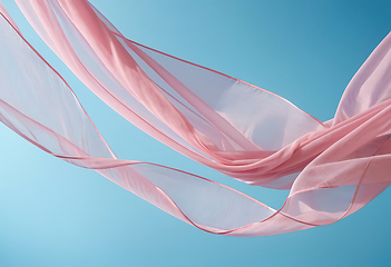 Image showing Flying pink fabric wave on blue background, flowing waving silk 