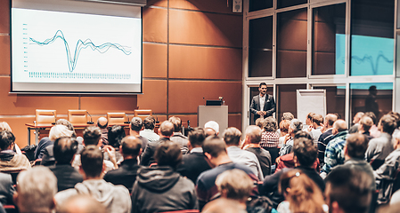 Image showing Business speaker giving a talk in conference hall.