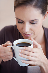 Image showing Woman, coffee and aroma, relax in apartment for comfort or morning routine with warm drink. Caffeine beverage, latte or espresso smell with peace and calm for chill at home with positive attitude