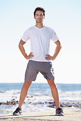 Image showing Man, fitness and portrait on beach, runner outdoor for cardio and exercise, ocean and nature with athlete. Sports, running and endurance with training or workout for health and wellness with travel