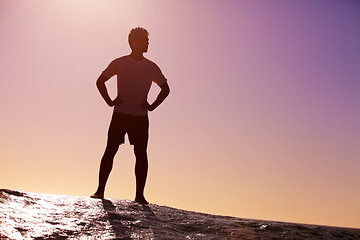 Image showing Man, horizon and sky with hiking on cliff in nature for adventure and fitness, mockup space and travel. Trekking, journey and hiker outdoor with view, sunset color and exercise on mountain trip