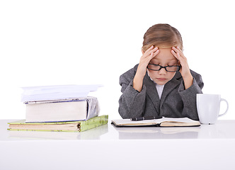 Image showing Child, work and suit for future job or career stress at desk or professional, notebook or white background. Girl, tired and frustrated in studio or research burnout dress up, employment or mockup