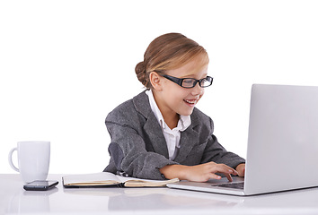 Image showing Business person, child and typing on laptop in studio, email and report or proposal on white background. Female person, pretend professional and playing fantasy game on tech, web and online research