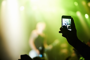 Image showing Nightclub, festival and audience with phone or lights for music, party and rave concert with silhouette and band. Disco, psychedelic event and performance with entertainment, crowd and smartphone