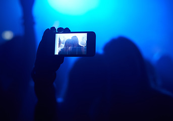 Image showing Nightclub, festival and audience with selfie or lights for music, party and rave concert with silhouette and memory. Disco, psychedelic event and performance with entertainment, crowd and smartphone