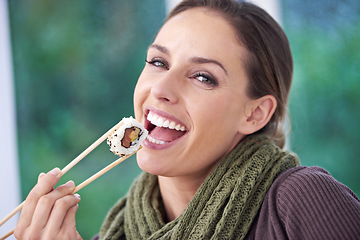 Image showing Happy woman, eating sushi and healthy food in portrait, lunch or dinner, Japanese cuisine and seafood with chopsticks. Catering, hungry and diet, relax with meal at home and dish for nutrition