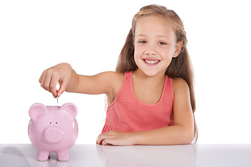 Image showing Girl kid, piggy bank and coins for portrait, studio and pride with smile for investing by white background. Child, container or animal toys with relax for money, cash or happy for financial education