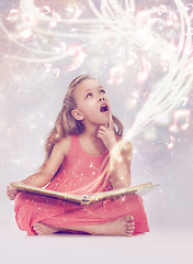 Image showing Child, book and magic fantasy or creativity for music listen or storytelling dream, sound or imagination. Female person, kid and whimsical notes or white background in studio, supernatural or mockup