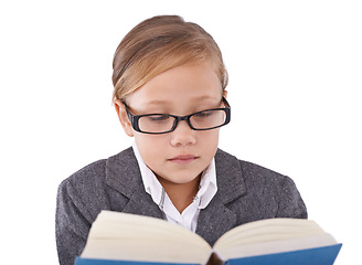 Image showing Girl, child and reading book for knowledge in studio, learning and fiction novel on white background. Female person, story and information for imagination development, education and studying literacy