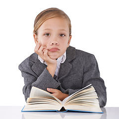 Image showing Girl, child and reading book for knowledge in portrait, learning and fiction novel on white background. Female person, studio and info for imagination development, education and studying literacy
