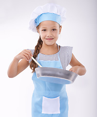 Image showing Child, chef and portrait with apron, confident and development on white background. Culinary skills, happy and learning to cook, food and childhood growth with confidence in hospitality industry