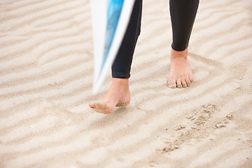 Image showing Surfer, walking or feet on beach sand with surfboard on vacation for fitness training, wellness or travel. Legs of athlete, person or surfing at sea on holiday in Hawaii or ocean in extreme sports