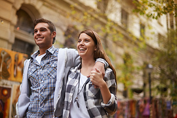 Image showing Happy, walk and urban couple hug, smile and bonding on relax journey, morning trip or weekend date. Relationship trust, security and romantic people commute for public tour, fresh air or wellness