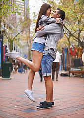 Image showing Couple, hug and outdoor in city, happy and excited with love, bonding together and romantic relationship. Cape town, embrace and enjoy with boyfriend and girlfriend in street, summer and dating