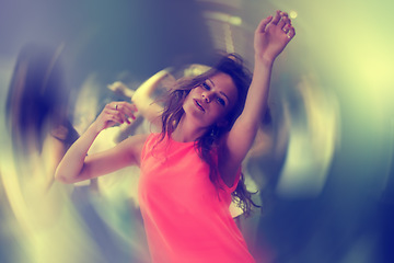 Image showing Club, portrait and woman on dance floor with energy, blur or freedom, music or celebration. Party, concert or lady person in crowd with movement, motion and good vibes at festival, event or nightclub