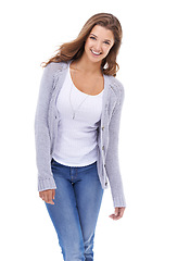 Image showing Woman, positive attitude and style in studio portrait, smile and confidence for trendy fashion on white background. Female person, face and happy in casual outfit, satisfaction and laugh for humor