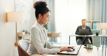 Image showing Woman with desk, laptop and typing in coworking space, market research and online schedule at consulting agency. Office, admin business and girl at computer writing email review, feedback or report.