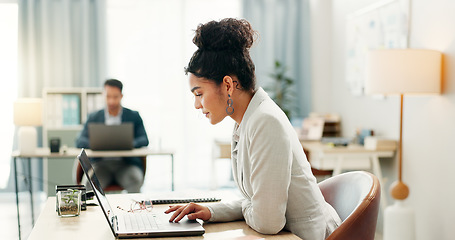Image showing Woman with desk, laptop and typing in coworking space, market research and online schedule at consulting agency. Office, admin business and girl at computer writing email review, feedback or report.