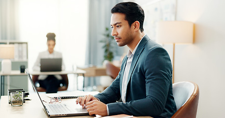 Image showing Man at desk, laptop and typing in coworking space, market research and online schedule at consulting agency. Office, admin and happy businessman at computer writing email review, feedback or report.