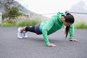Image showing Press ups, woman and outdoor with fitness, health and active for wellness and training. Fresh air, person and athlete with challenge, mountains and freedom with practice, endurance and progress